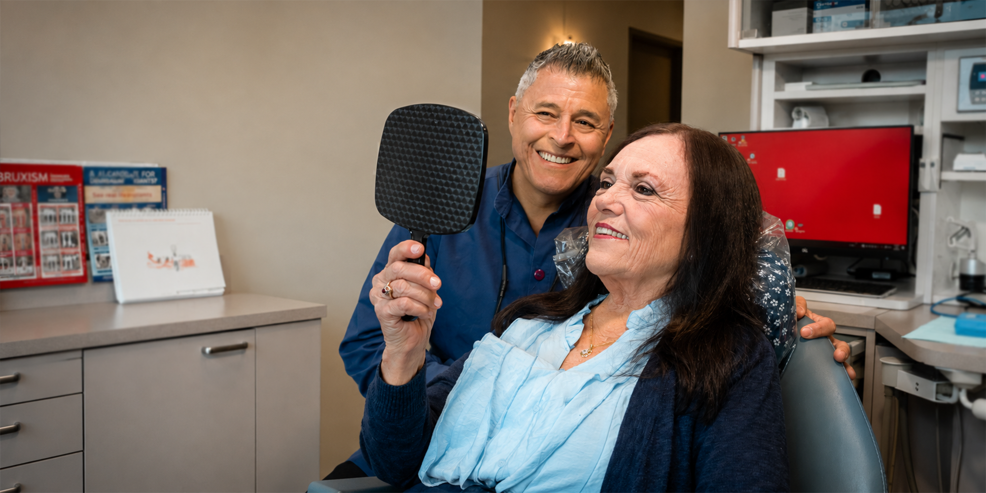 Dr. Dorantes smiling with his patient Barbara
