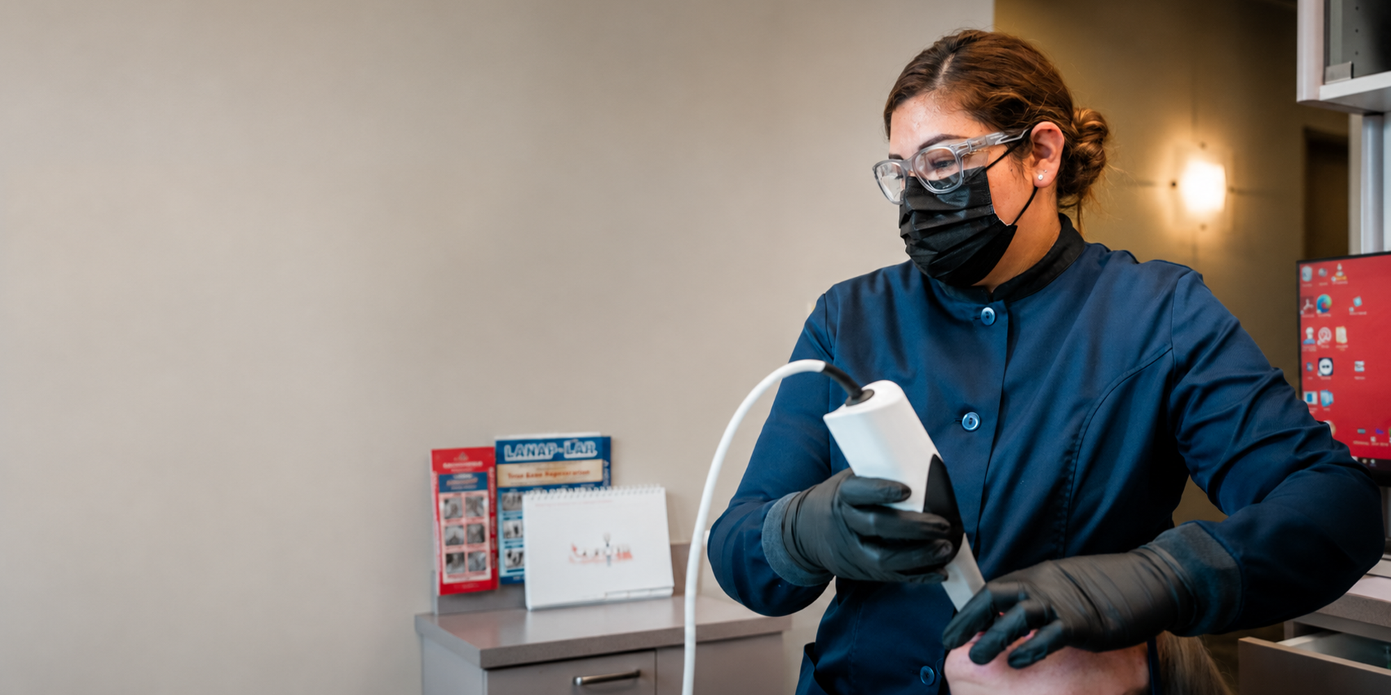 staff member doing an exam on a patient